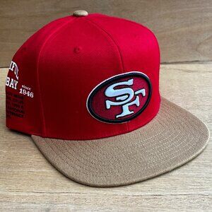 MITCHELL & NESS SAN FRANCISCO 49ER’S FAITHFUL TO BAY TEAM ORIGINS SNAPBACK HAT